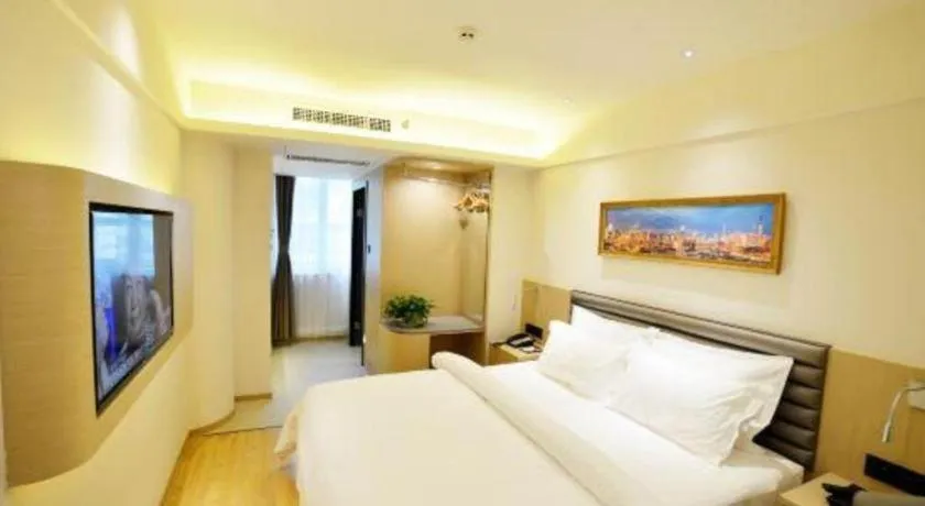 Bed in Metropolo Hotel Qingdao Wusi Square Xiaomaidao