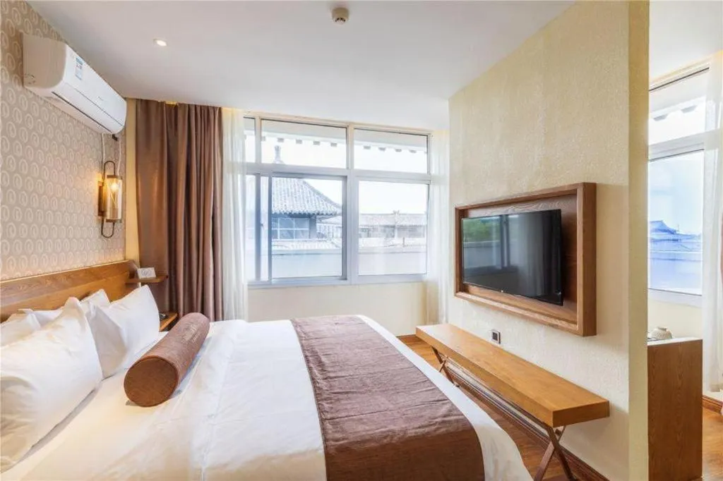 Bed in James Joyce Coffetel Qufu Tourist Center Gulou Street Sankong Scenic Spot