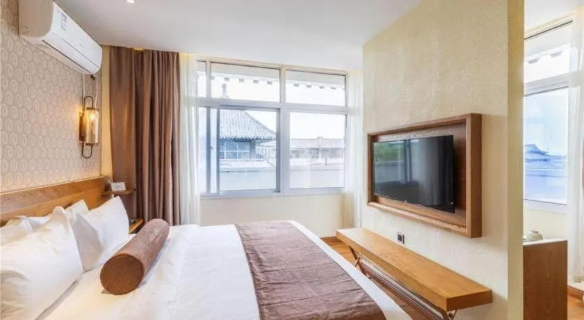 Bed in James Joyce Coffetel Qufu Tourist Center Gulou Street Sankong Scenic Spot