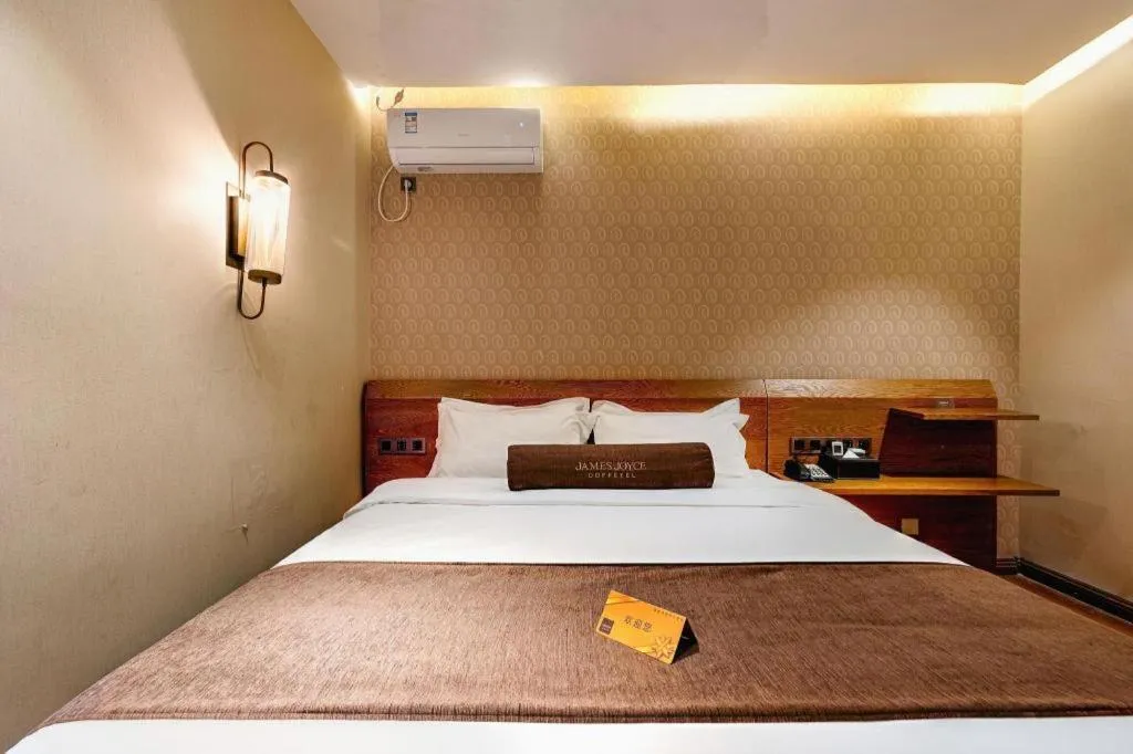 Bed in James Joyce Coffetel Qufu Tourist Center Gulou Street Sankong Scenic Spot