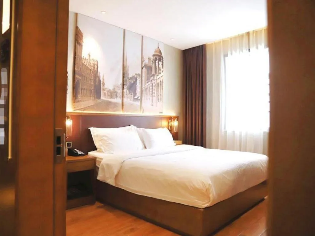 Bed in James Joyce Coffetel Guangzhou Dongxiaonan Metro Station Branch