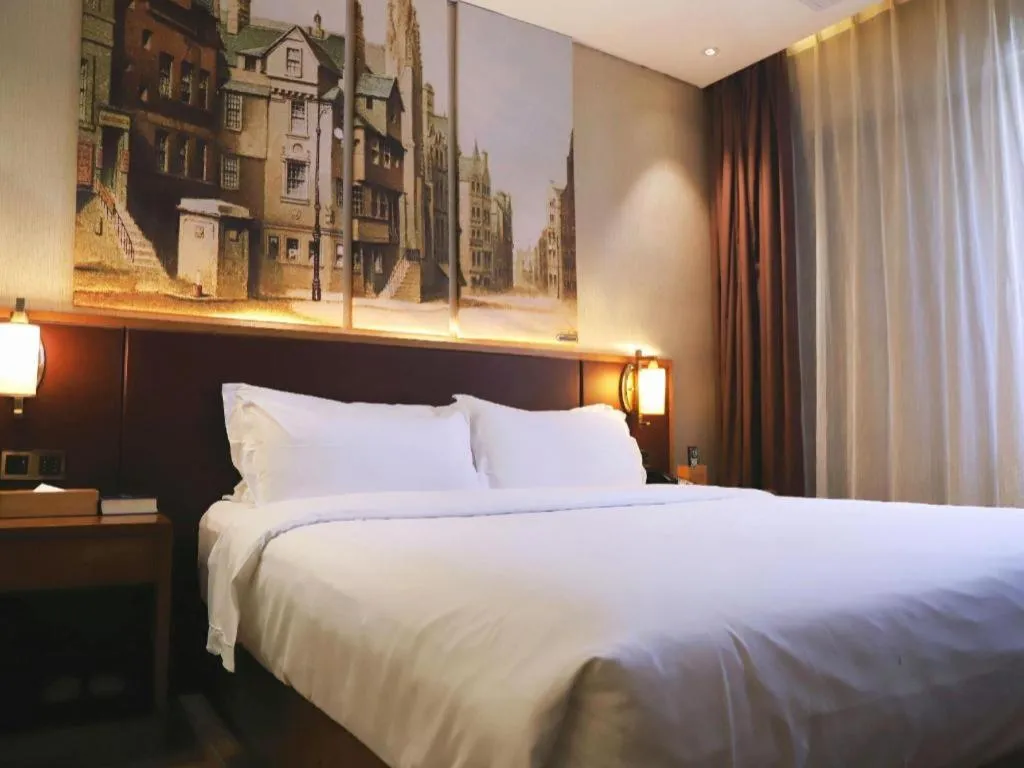 Bed in James Joyce Coffetel Guangzhou Dongxiaonan Metro Station Branch