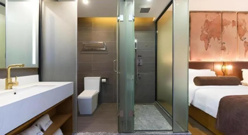 Bed in James Joyce Coffetel Guangzhou Dongxiaonan Metro Station Branch