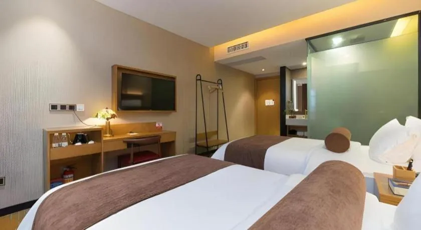 Bed in James Joyce Coffetel Guangzhou Dongxiaonan Metro Station Branch