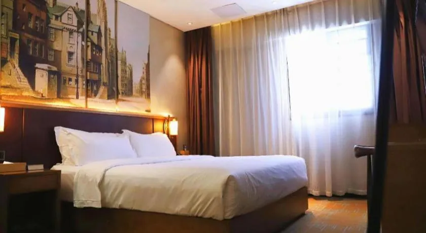 Bed in James Joyce Coffetel Guangzhou Dongxiaonan Metro Station Branch