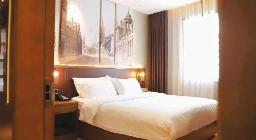 Bed in James Joyce Coffetel Guangzhou Dongxiaonan Metro Station Branch