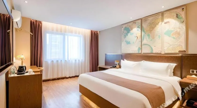 Bed in James Joyce Coffetel Xinyang Xixian Longhu Huayi