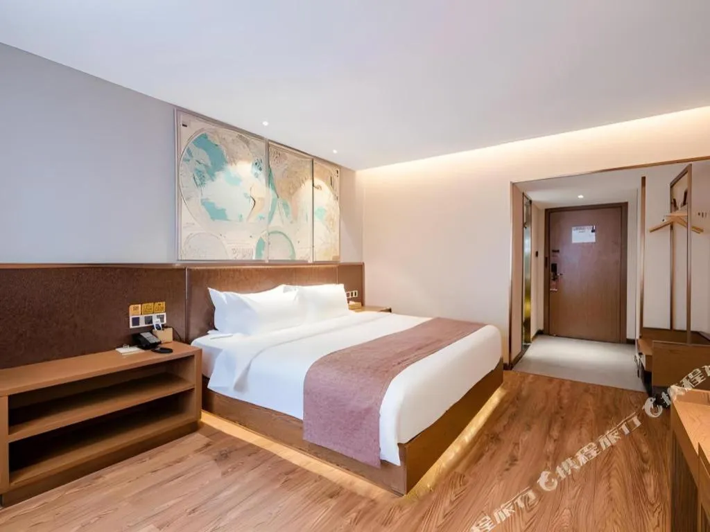 Bed in James Joyce Coffetel Xinyang Xixian Longhu Huayi