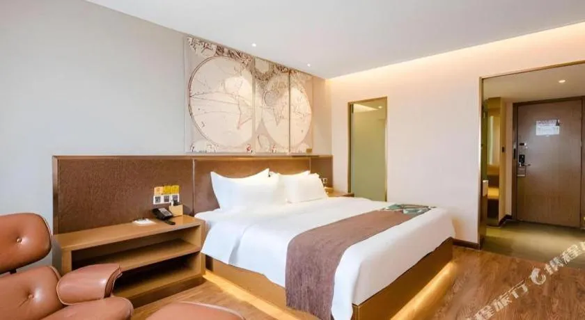 Bed in James Joyce Coffetel Xinyang Xixian Longhu Huayi