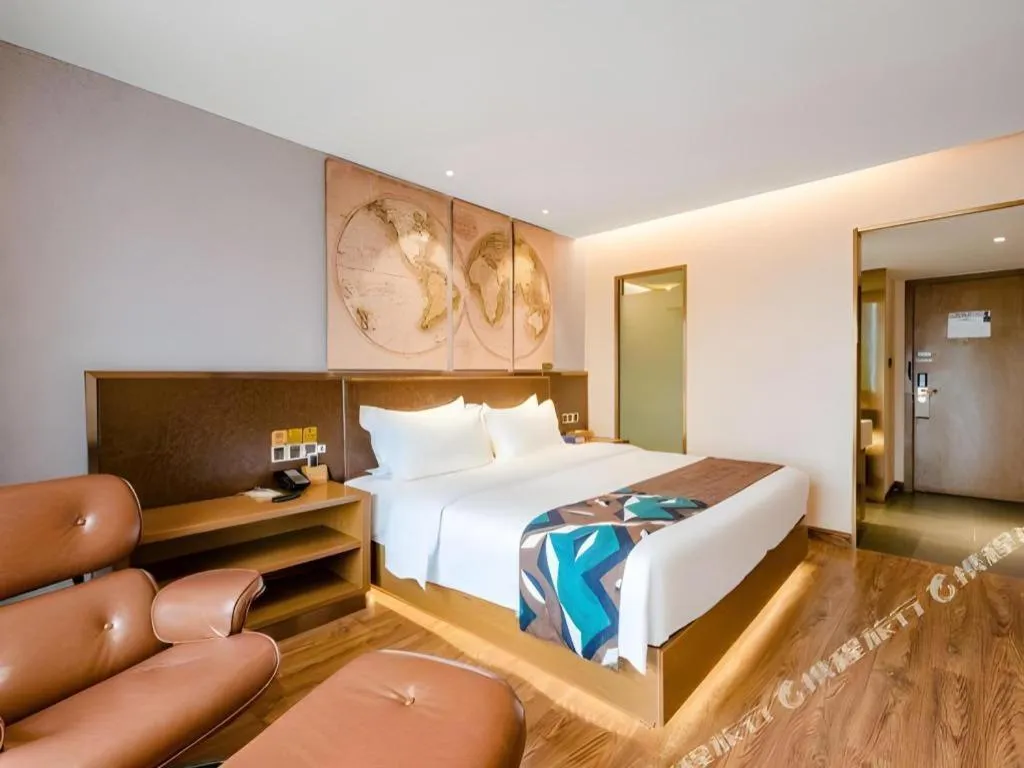 Bed in James Joyce Coffetel Xinyang Xixian Longhu Huayi