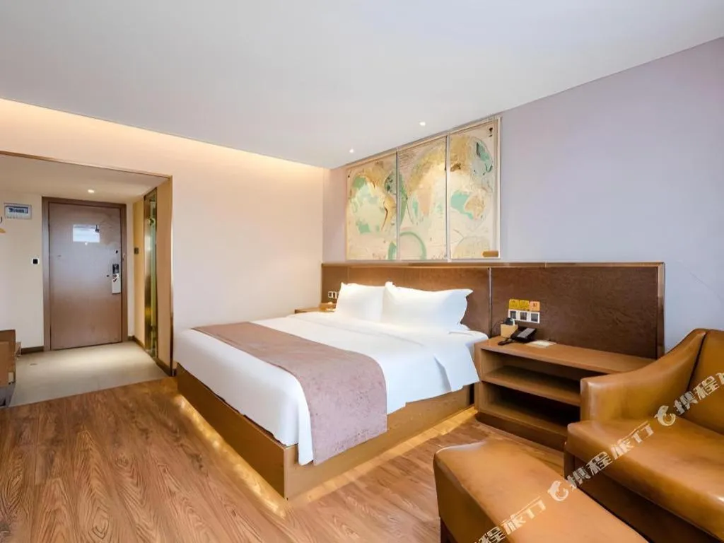 Bed in James Joyce Coffetel Xinyang Xixian Longhu Huayi