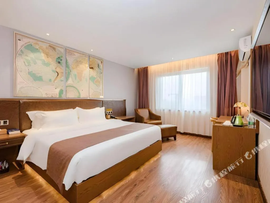 Bed in James Joyce Coffetel Xinyang Xixian Longhu Huayi