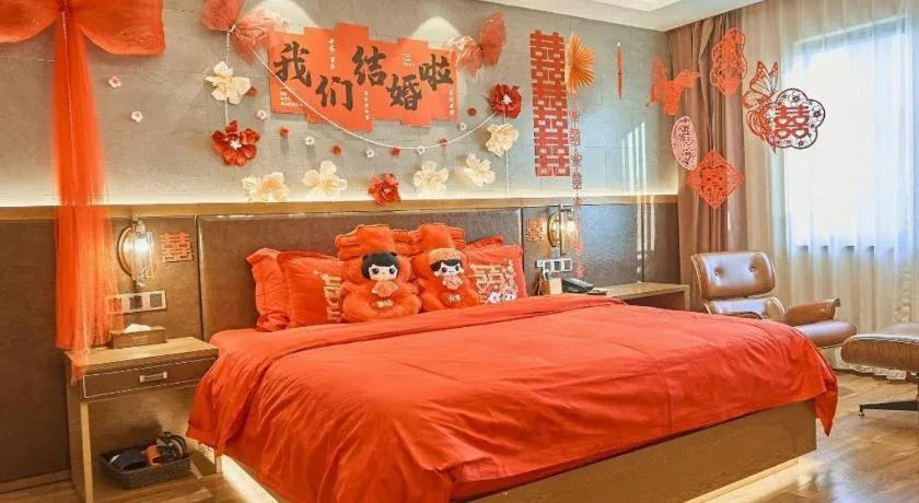 Bed in James Joyce Coffetel Xinyang Xixian Longhu Huayi