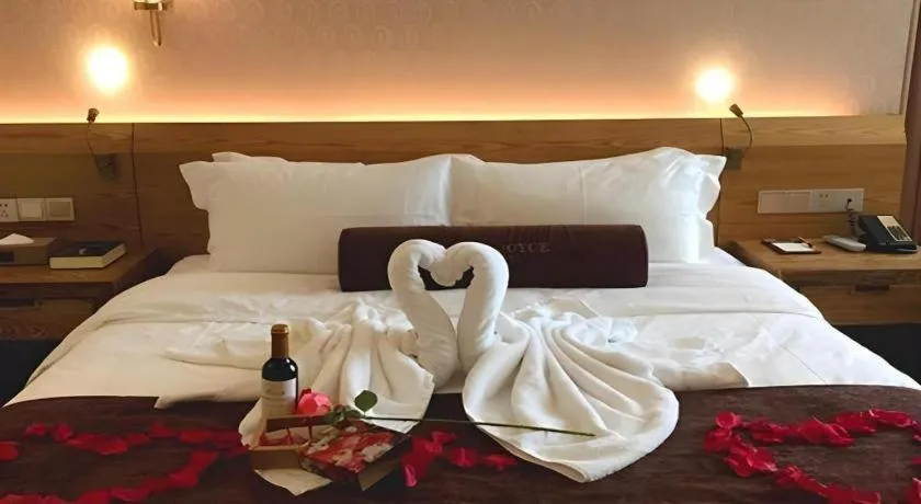 Bed in James Joyce Coffetel Baoding Gaobeidian Railway Station Branch