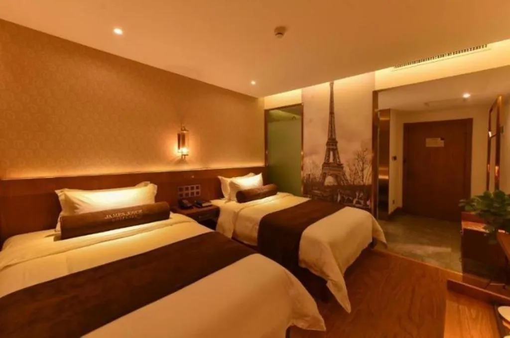 Bed in James Joyce Coffetel Baoding Gaobeidian Railway Station Branch