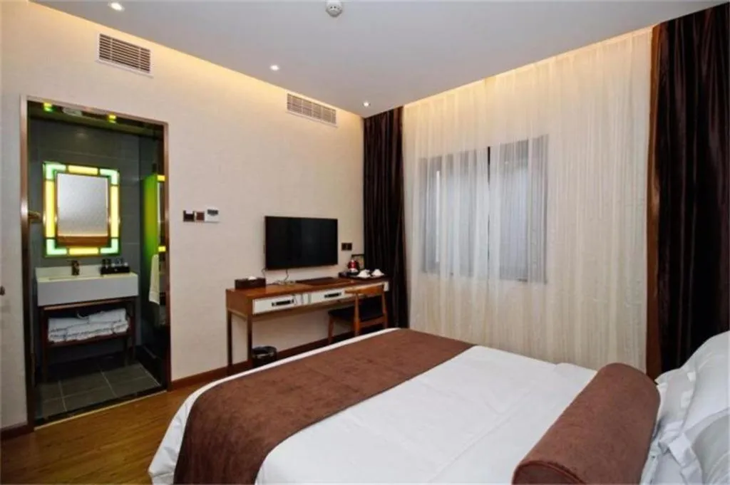 Bed in James Joyce Coffetel Dali Erhai Wetland Park