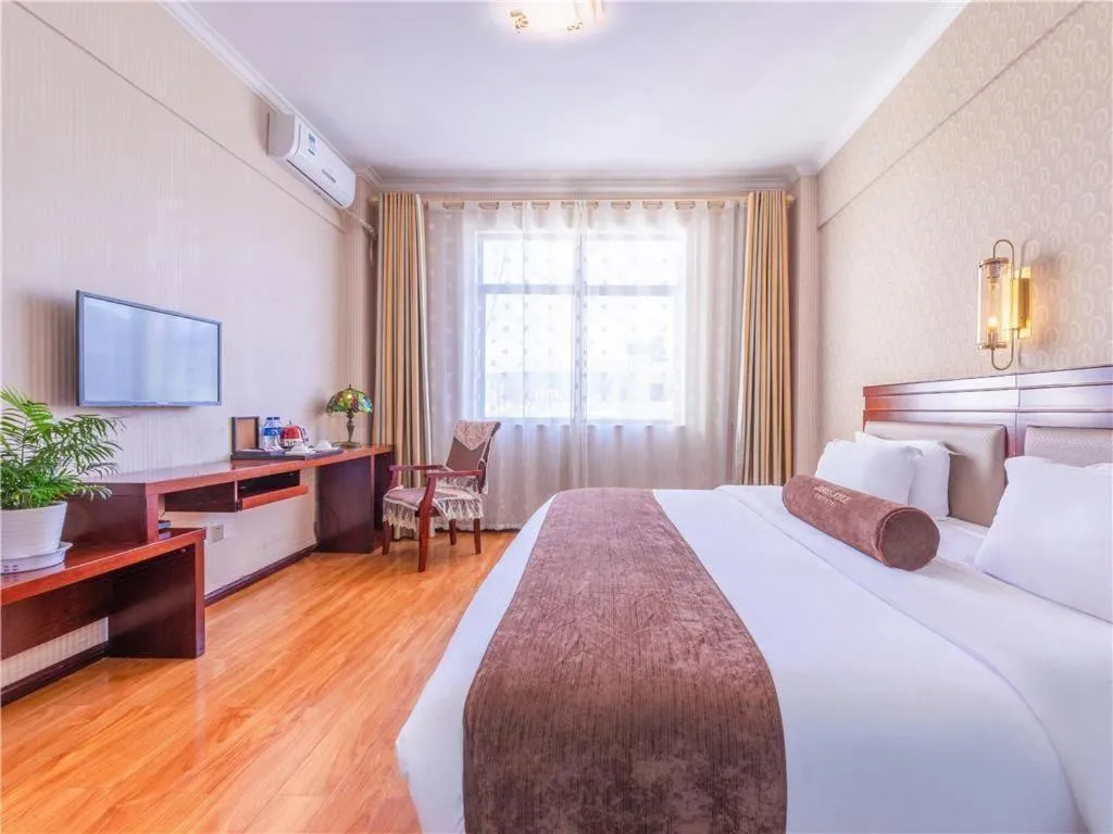 Bed in James Joyce Coffetel Dali Erhai Wetland Park