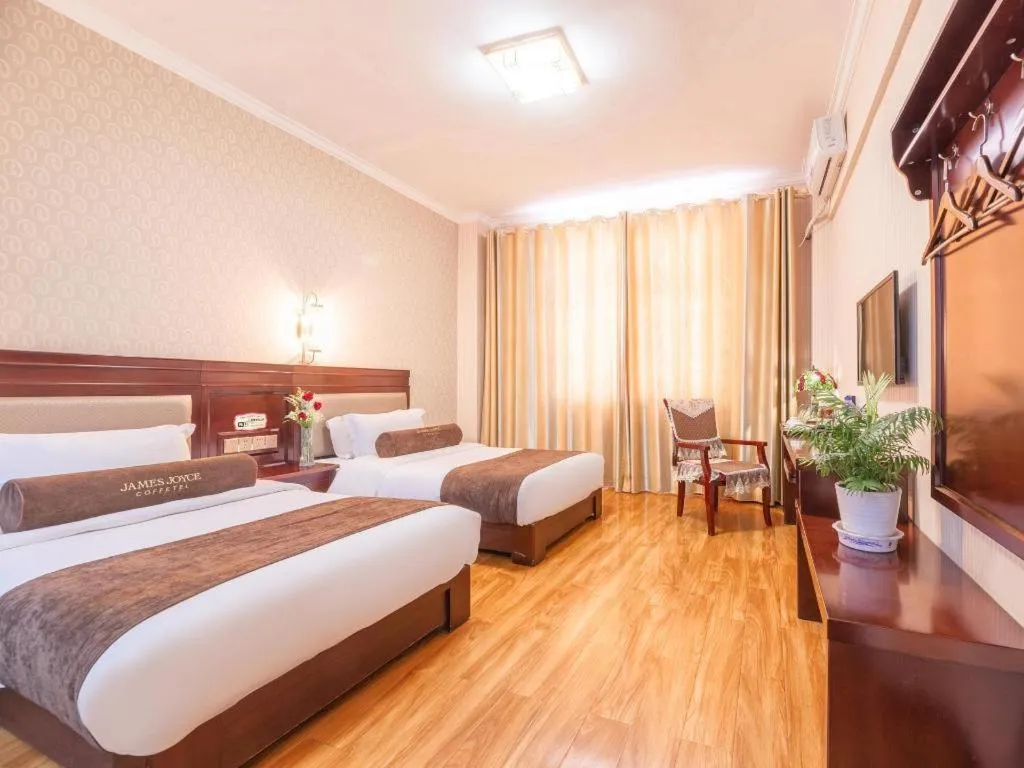 Bed in James Joyce Coffetel Dali Erhai Wetland Park