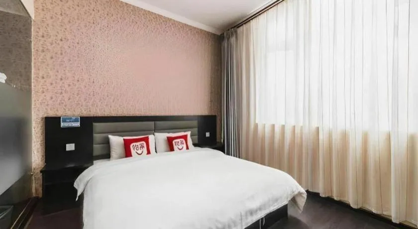 Bed in PAI Hotel Beijing Capital International Airport Linhe Development Zone