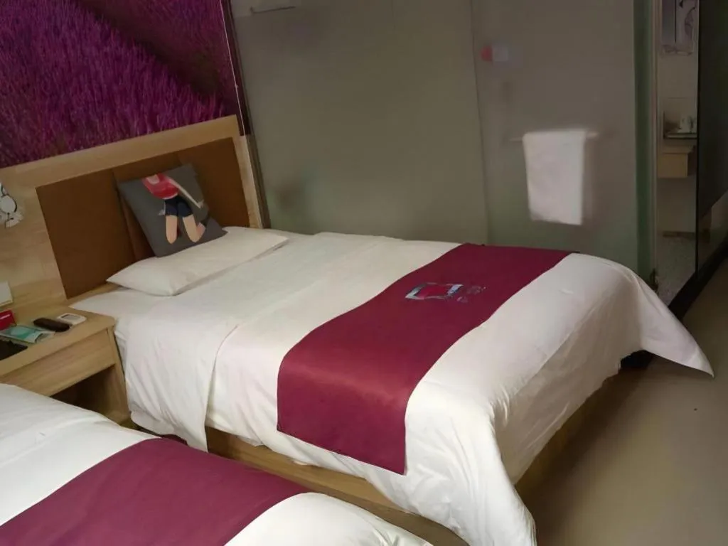 Bed in PAI Hotel Beijing Capital International Airport Linhe Development Zone