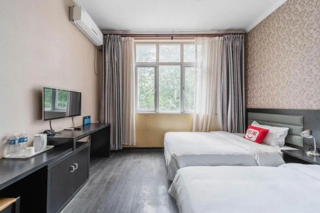 Bed in PAI Hotel Beijing Capital International Airport Linhe Development Zone