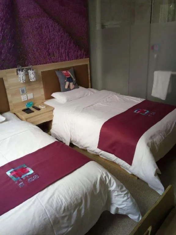 Bed in PAI Hotel Beijing Capital International Airport Linhe Development Zone
