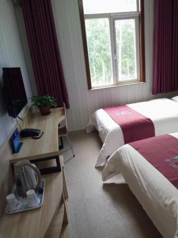 Bed in PAI Hotel Beijing Capital International Airport Linhe Development Zone