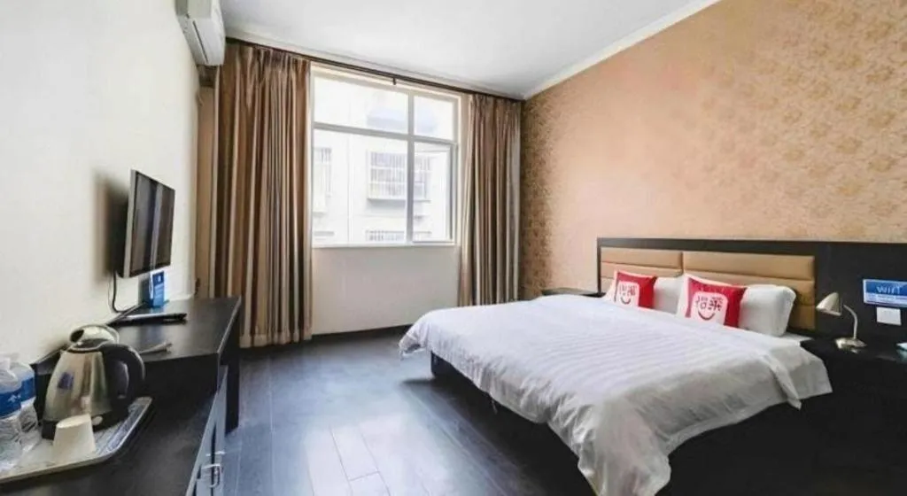 Bed in PAI Hotel Beijing Capital International Airport Linhe Development Zone