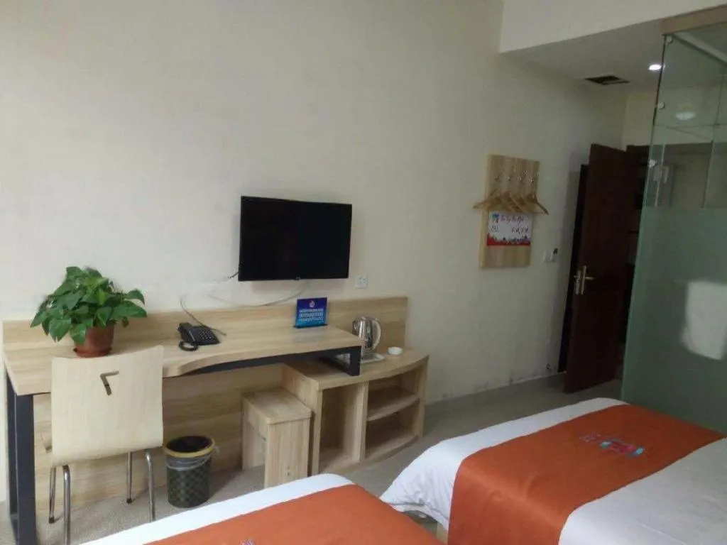 Bed in PAI Hotel Beijing Capital International Airport Linhe Development Zone