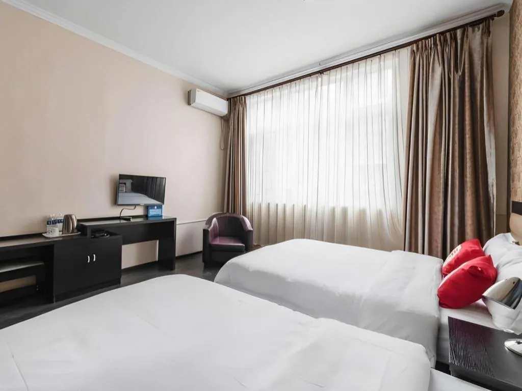 Bed in PAI Hotel Beijing Capital International Airport Linhe Development Zone