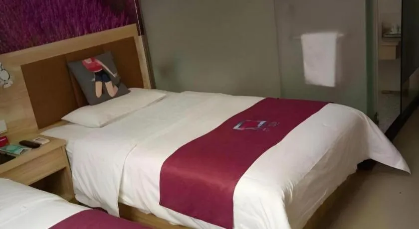 Bed in PAI Hotel Beijing Capital International Airport Linhe Development Zone
