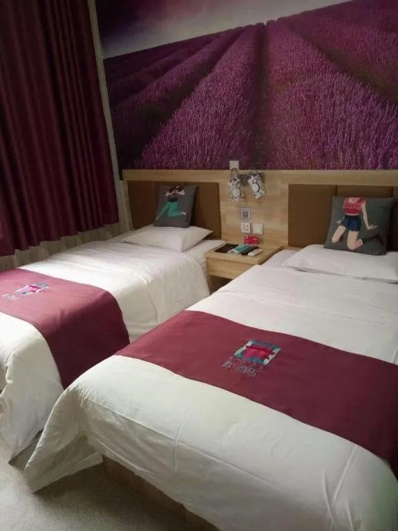 Bed in PAI Hotel Beijing Capital International Airport Linhe Development Zone