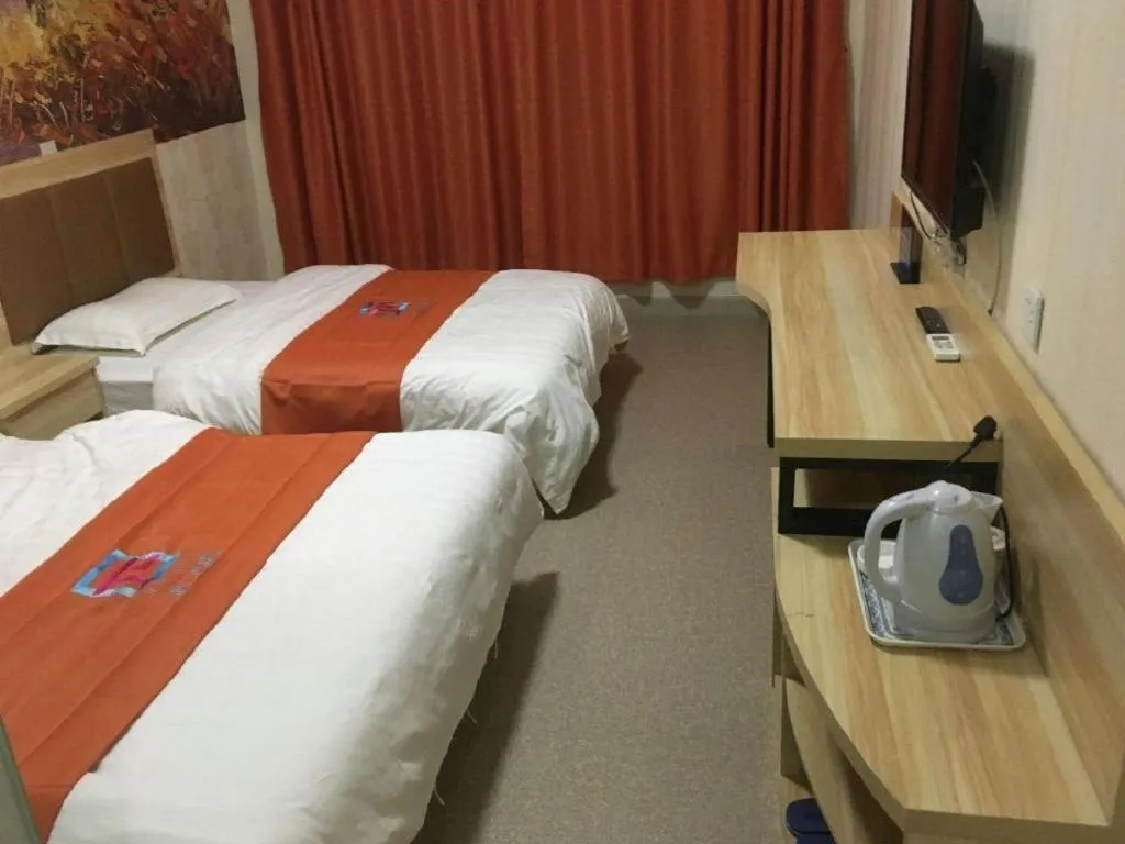 Bed in PAI Hotel Beijing Capital International Airport Linhe Development Zone