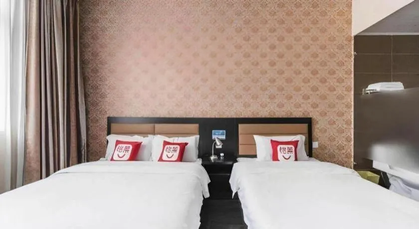 Bed in PAI Hotel Beijing Capital International Airport Linhe Development Zone