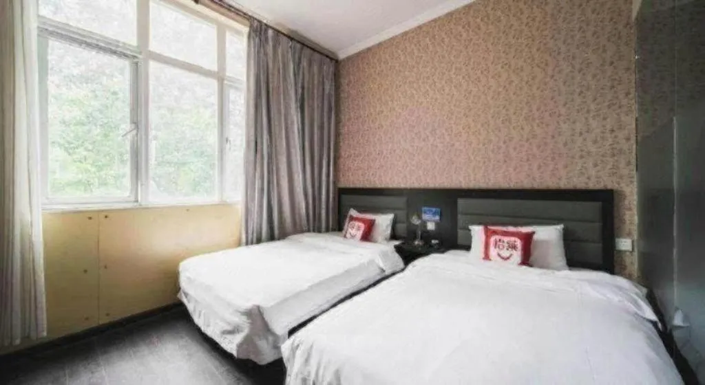 Bed in PAI Hotel Beijing Capital International Airport Linhe Development Zone