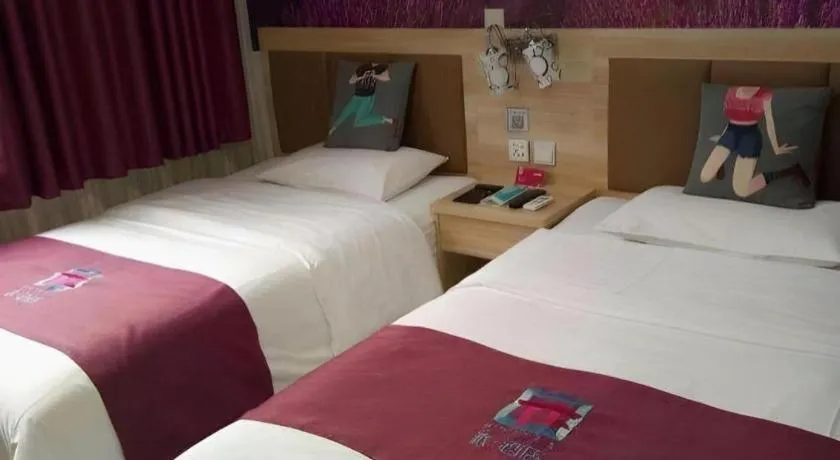 Bed in PAI Hotel Beijing Capital International Airport Linhe Development Zone