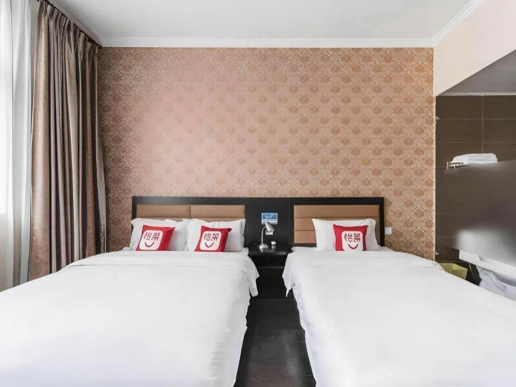 Bed in PAI Hotel Beijing Capital International Airport Linhe Development Zone