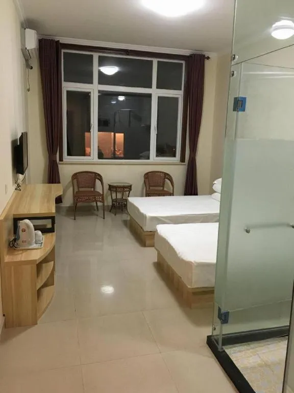 Bed in PAI Hotel Beijing Capital International Airport Linhe Development Zone