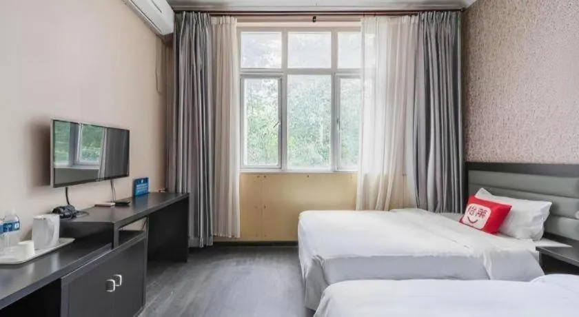 Bed in PAI Hotel Beijing Capital International Airport Linhe Development Zone