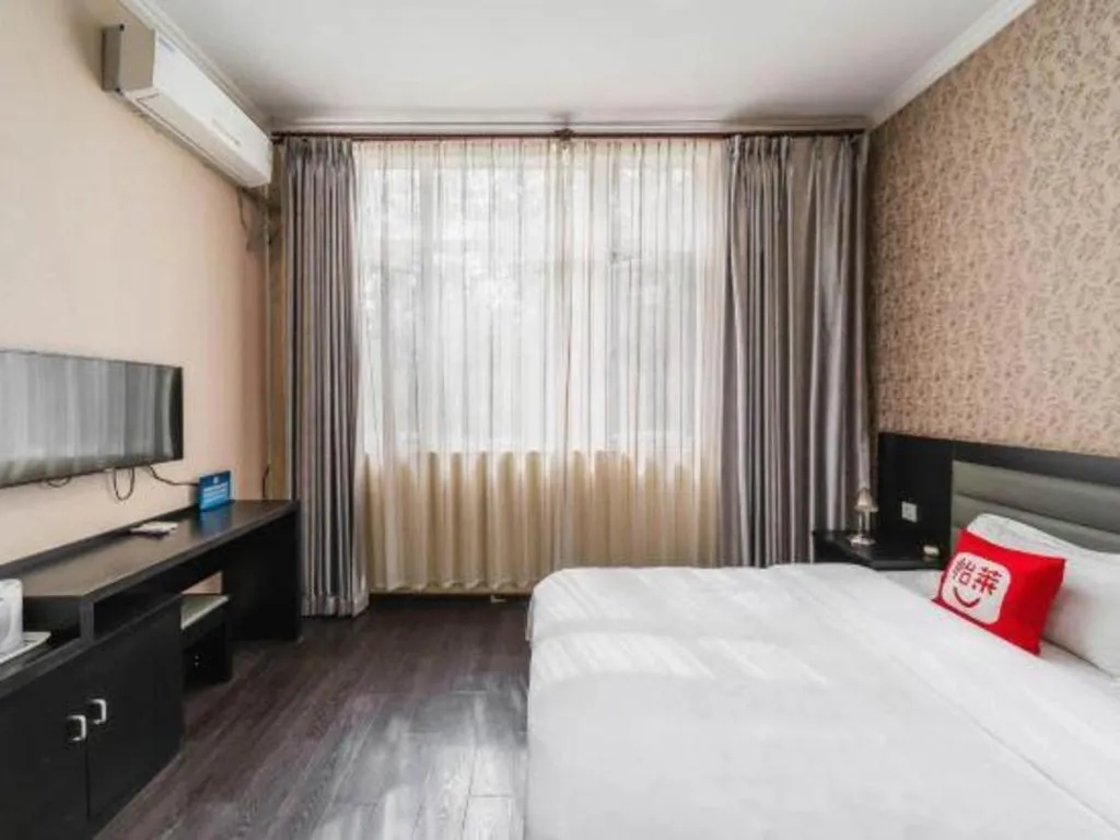 Bed in PAI Hotel Beijing Capital International Airport Linhe Development Zone