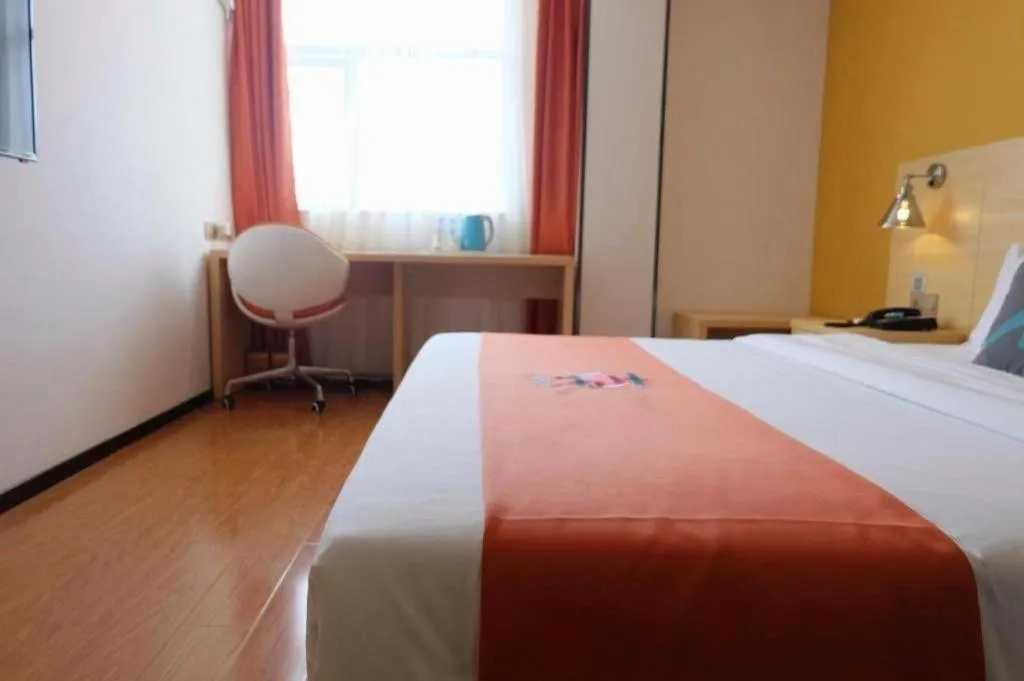 Bed in PAI Hotel Guangzhou North Gate of Chimelong Zoo