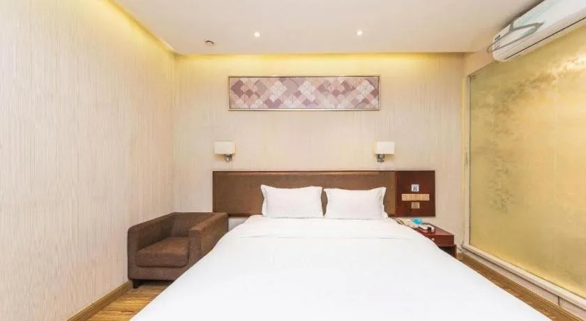 Bed in PAI Hotel Guangzhou North Gate of Chimelong Zoo