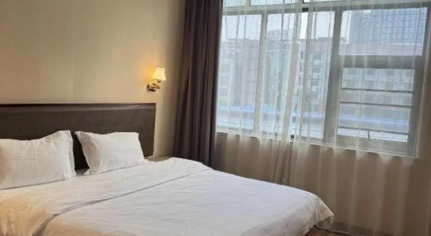 Bed in PAI Hotel Guangzhou North Gate of Chimelong Zoo