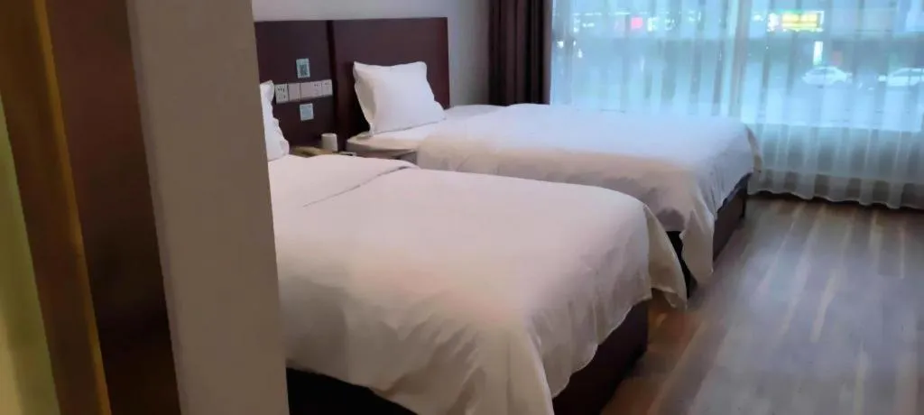 Bed in PAI Hotel Guangzhou North Gate of Chimelong Zoo