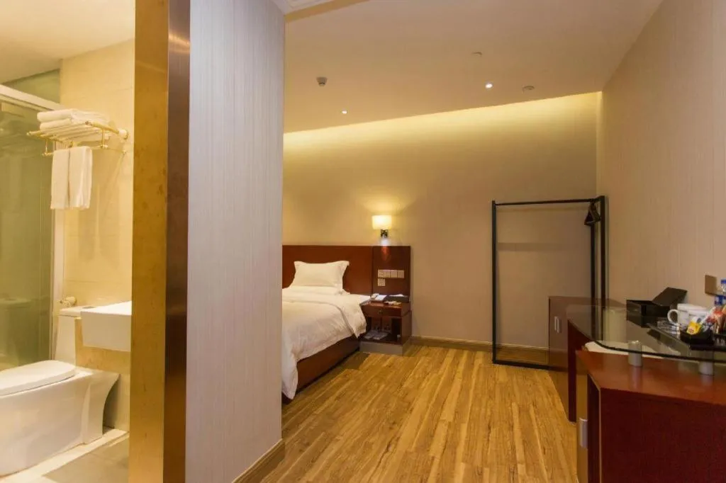 Bed in PAI Hotel Guangzhou North Gate of Chimelong Zoo