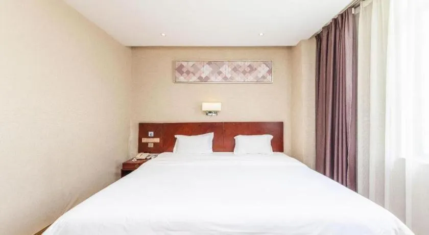 Bed in PAI Hotel Guangzhou North Gate of Chimelong Zoo