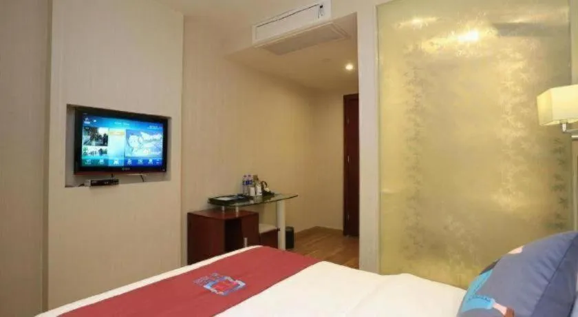 Bed in PAI Hotel Guangzhou North Gate of Chimelong Zoo