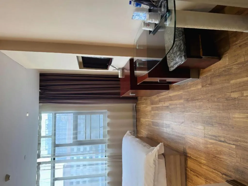 Bed in PAI Hotel Guangzhou North Gate of Chimelong Zoo