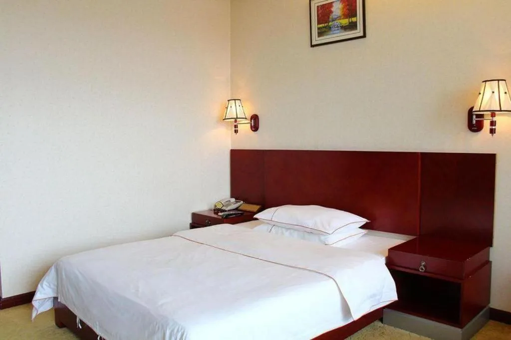 Bed in PAI Hotel Guangzhou North Gate of Chimelong Zoo