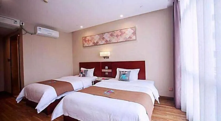 Bed in PAI Hotel Guangzhou North Gate of Chimelong Zoo